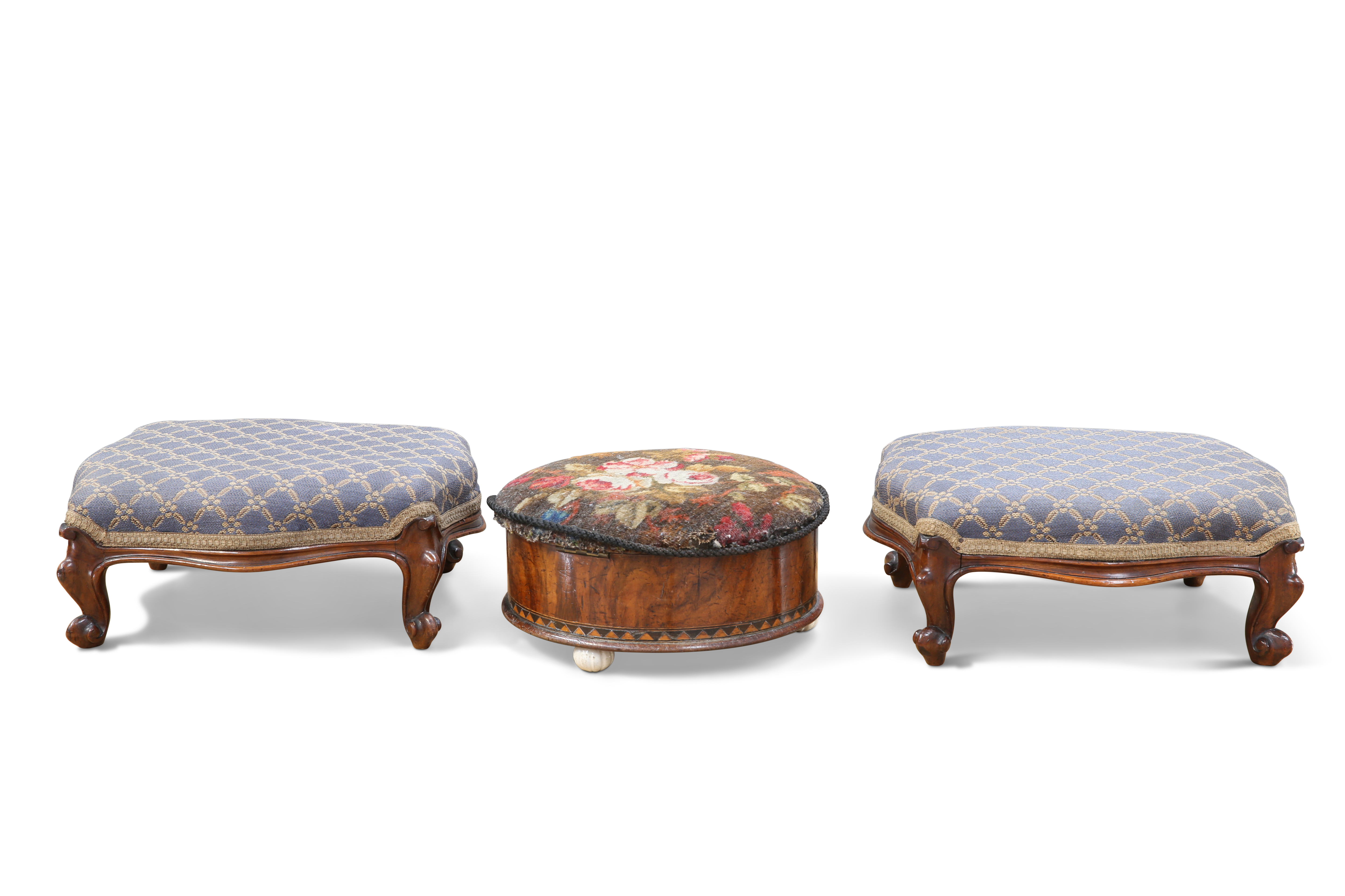 A PAIR OF VICTORIAN WALNUT AND UPHOLSTERED FOOTSTOOLS