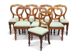 A SET OF EIGHT VICTORIAN MAHOGANY BALLOON BACK DINING CHAIRS