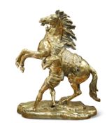 AFTER COUSTOU, A LARGE 19TH CENTURY BRASS MODEL OF A MARLEY HORSE