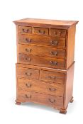 A GEORGE III STYLE MAHOGANY MINIATURE CHEST ON CHEST,