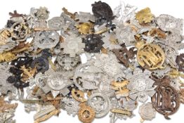 A COLLECTION OF CAP BADGES