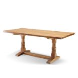 ROBERT THOMPSON OF KILBURN, A MOUSEMAN OAK DINING TABLE