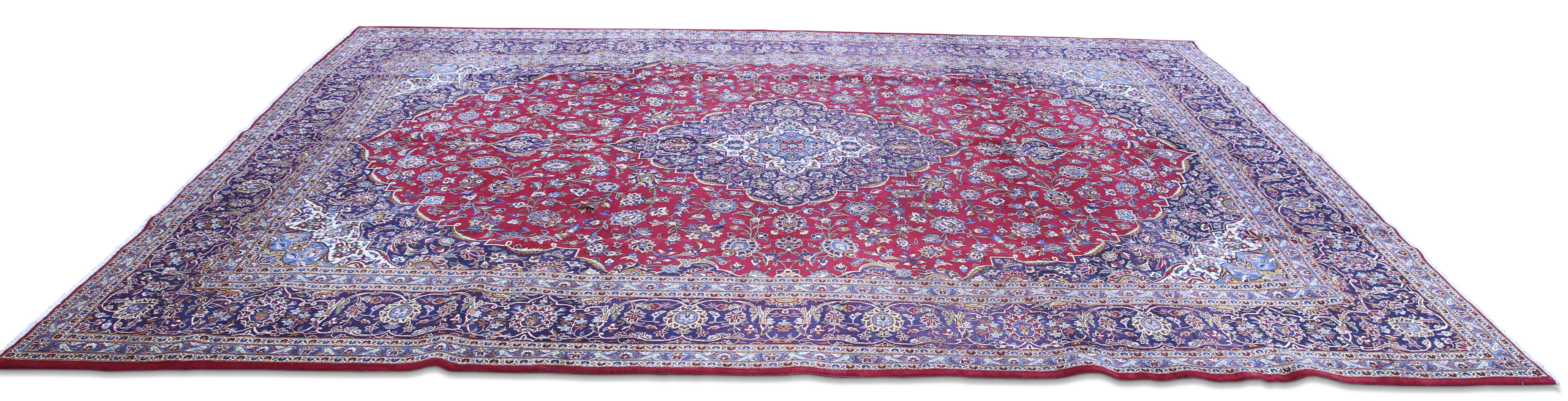 A PERSIAN KASHAN CARPET