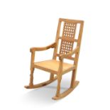 ROBERT THOMPSON OF KILBURN, A MOUSEMAN OAK ROCKING CHAIR