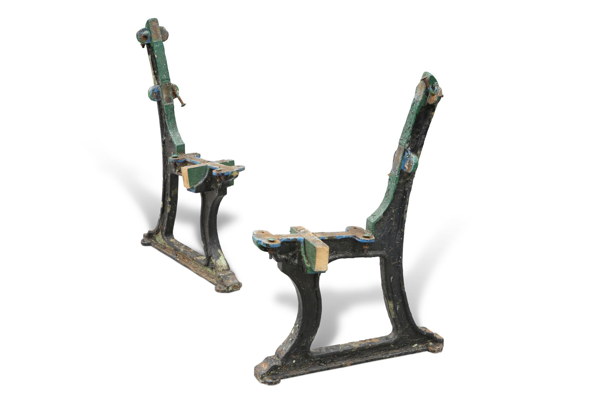 A PAIR OF CAST IRON BENCH SUPPORTS