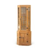 ROBERT THOMPSON OF KILBURN, A MOUSEMAN OAK FLOOR-STANDING CORNER CABINET