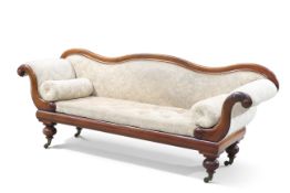 A VICTORIAN LARGE MAHOGANY AND UPHOLSTERED SETTEE