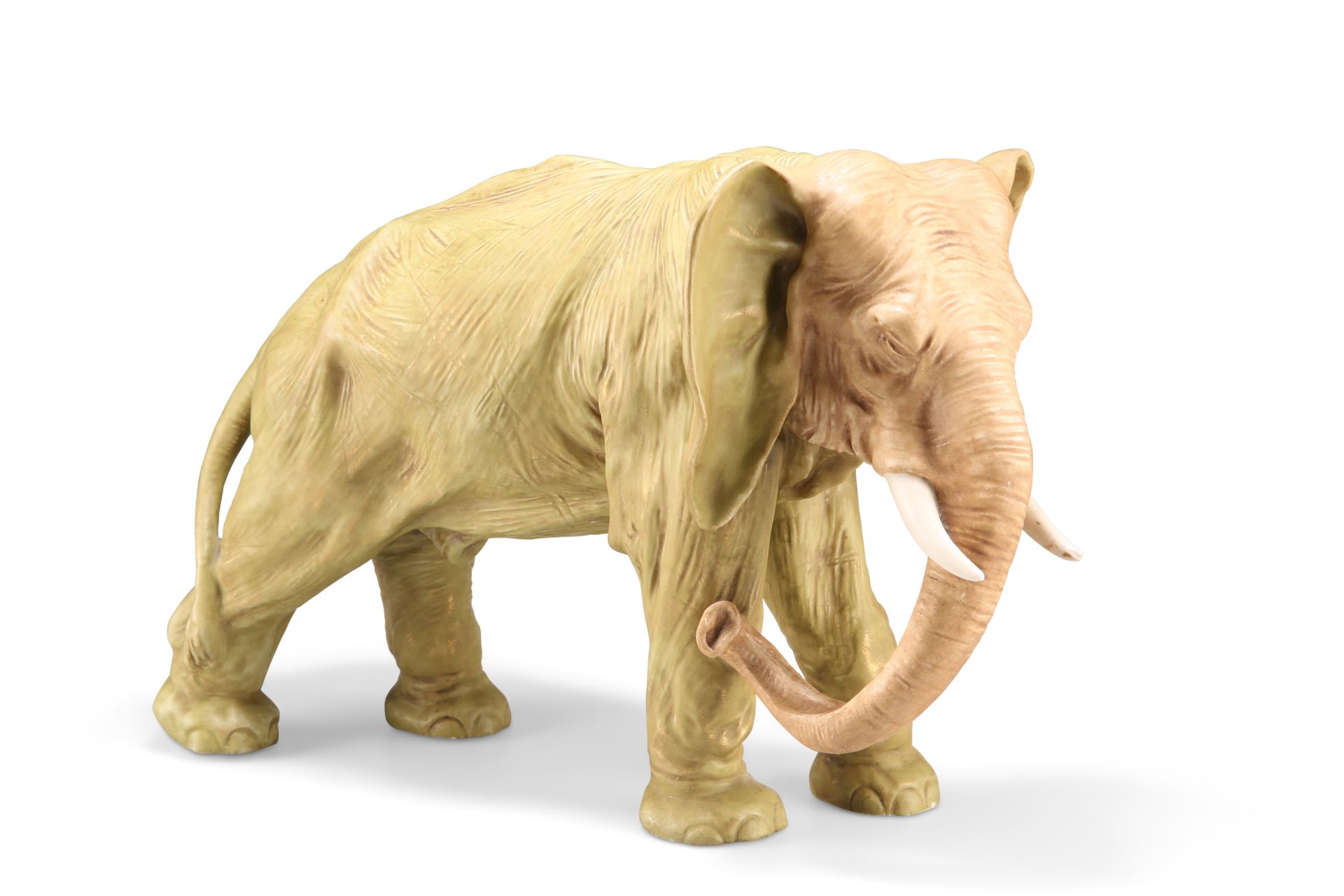 A ROYAL DUX LARGE MODEL OF AN ELEPHANT