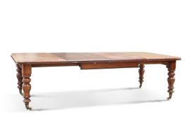 A VICTORIAN MAHOGANY WIND-OUT DINING TABLE