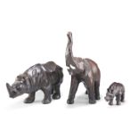 TWO LEATHER RHINOS AND A LEATHER ELEPHANT