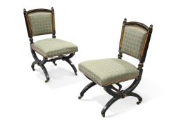 A PAIR OF AESTHETIC EBONISED AND PARCEL-GILT OCCASIONAL CHAIRS, BY LAMB OF MANCHESTER