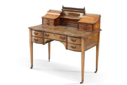 A LATE VICTORIAN INLAID ROSEWOOD DESK