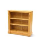 COXWOLD CABINET MAKERS, A UNICORN MAN OAK OPEN BOOKCASE