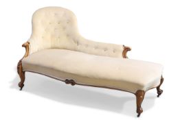 A VICTORIAN WALNUT CHAISE LONGUE