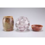 A soapstone vase, 8cm high, a soapstone bowl 6cm diameter, a Langham glass paperweight (3)