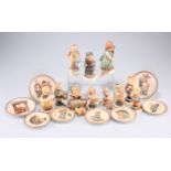 A collection of Hummel Goebel figures and plates