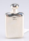 A small silver scent flask
