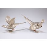 A pair of silver-plated pheasants