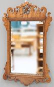 A George III mahogany fretwork mirror