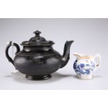 A black Jackfield type teapot and cover, 10cm high; and a small Continental blue and white porcelain