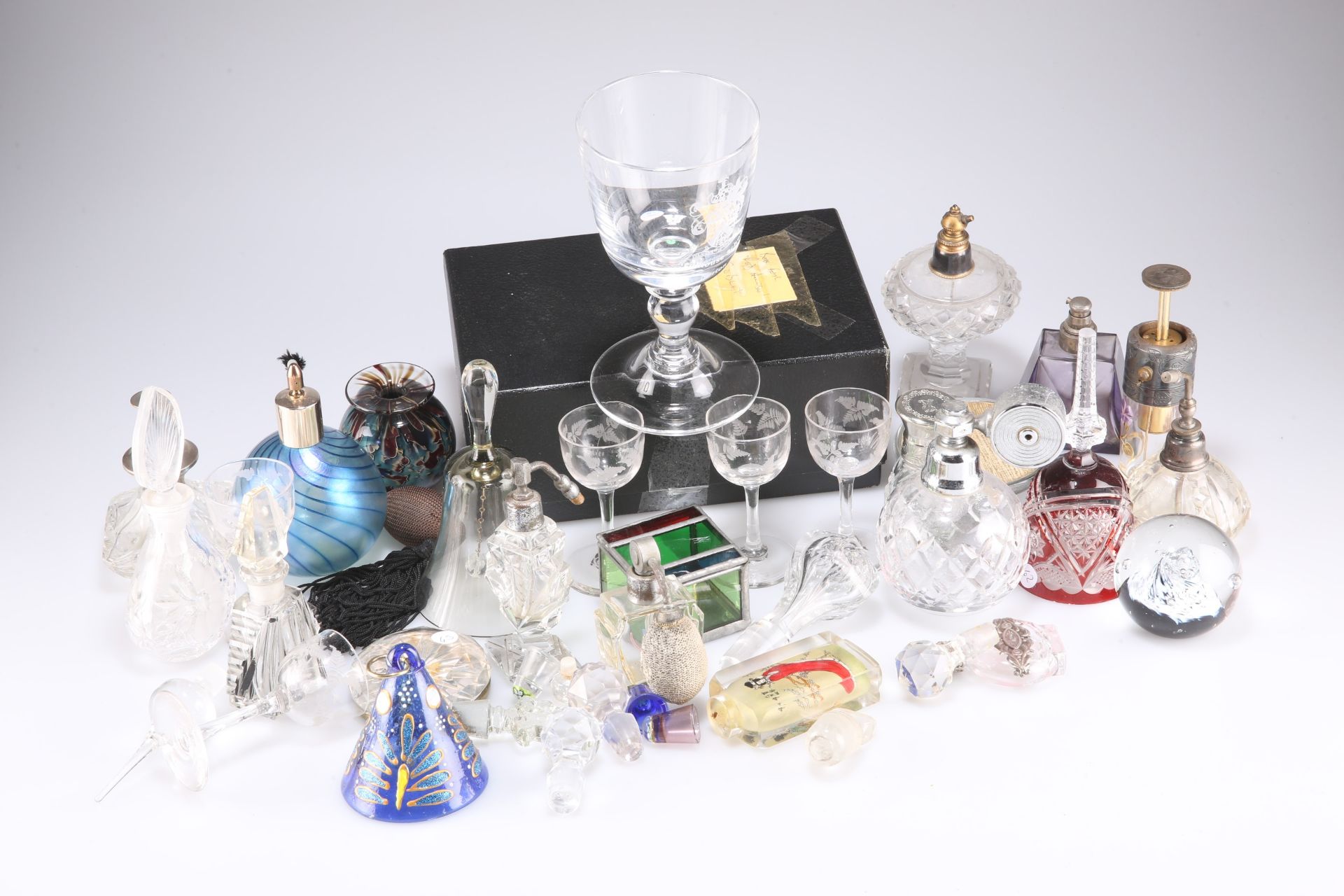 A quantity of glass perfume bottles, etc.