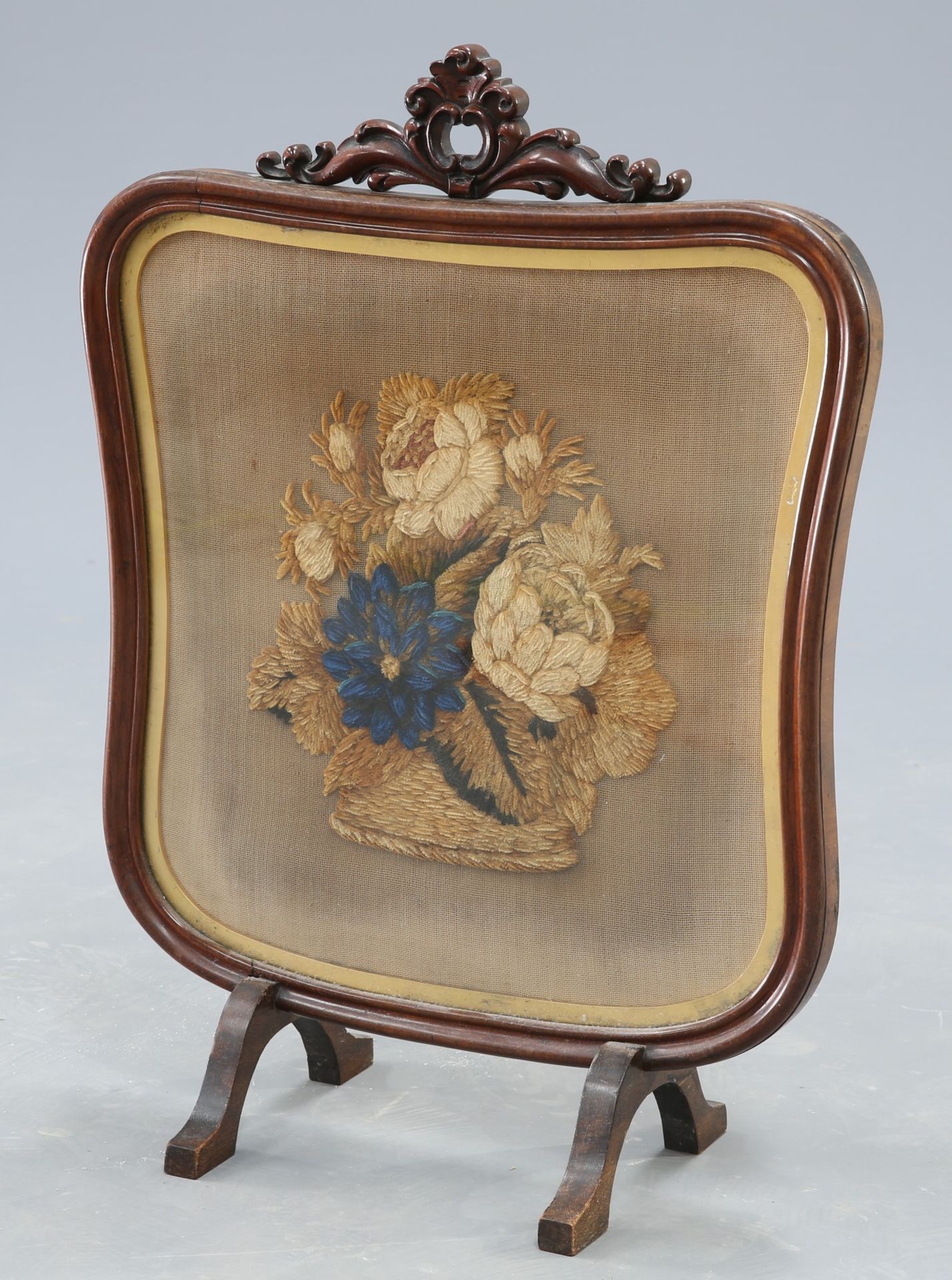 A 19th Century mahogany and needlework firescreen