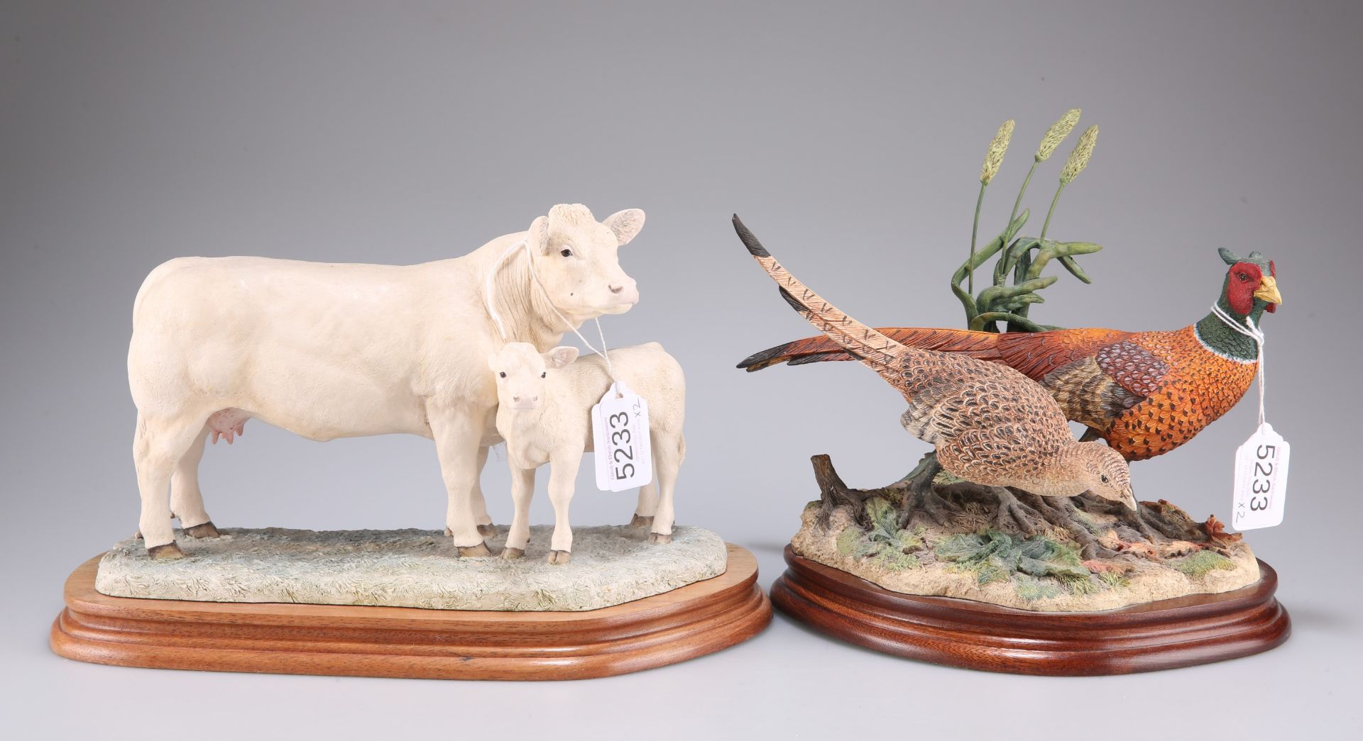 A Border Fine Arts figure of a Charolais cow and calf, 26cm long (ear a/f) and a Border Fine Arts fi