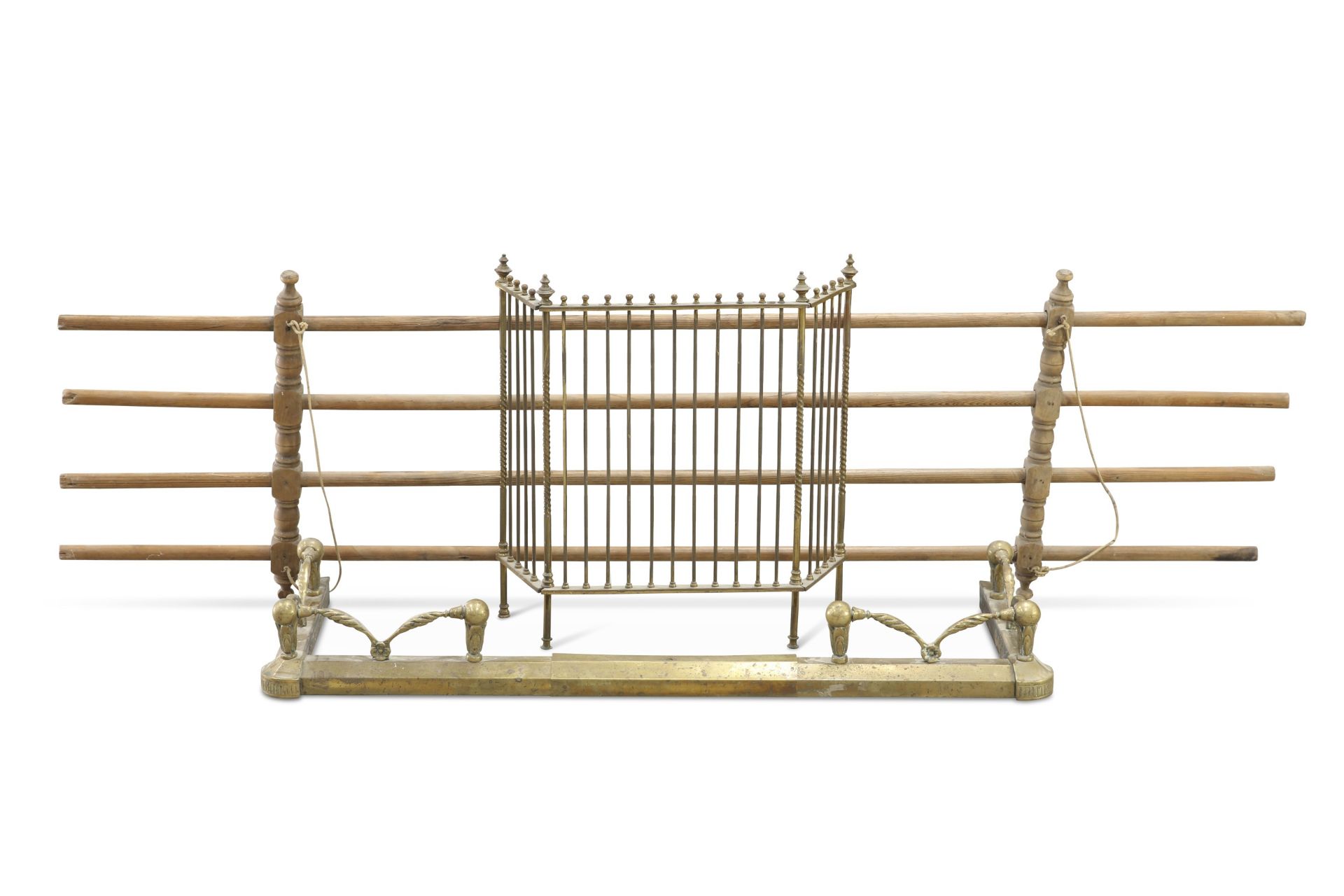 A Victorian pine clothes airer; together with an early 20th Century extending fender and an early