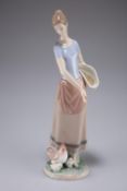 Lladro figure of a girl feeding hen with chicks, 30cm high, boxed