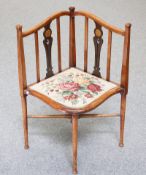 An Edwardian inlaid corner chair