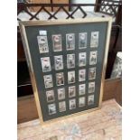 A framed collection of 25 Wills cigarette cards, together with an early photograph of Almondsbury