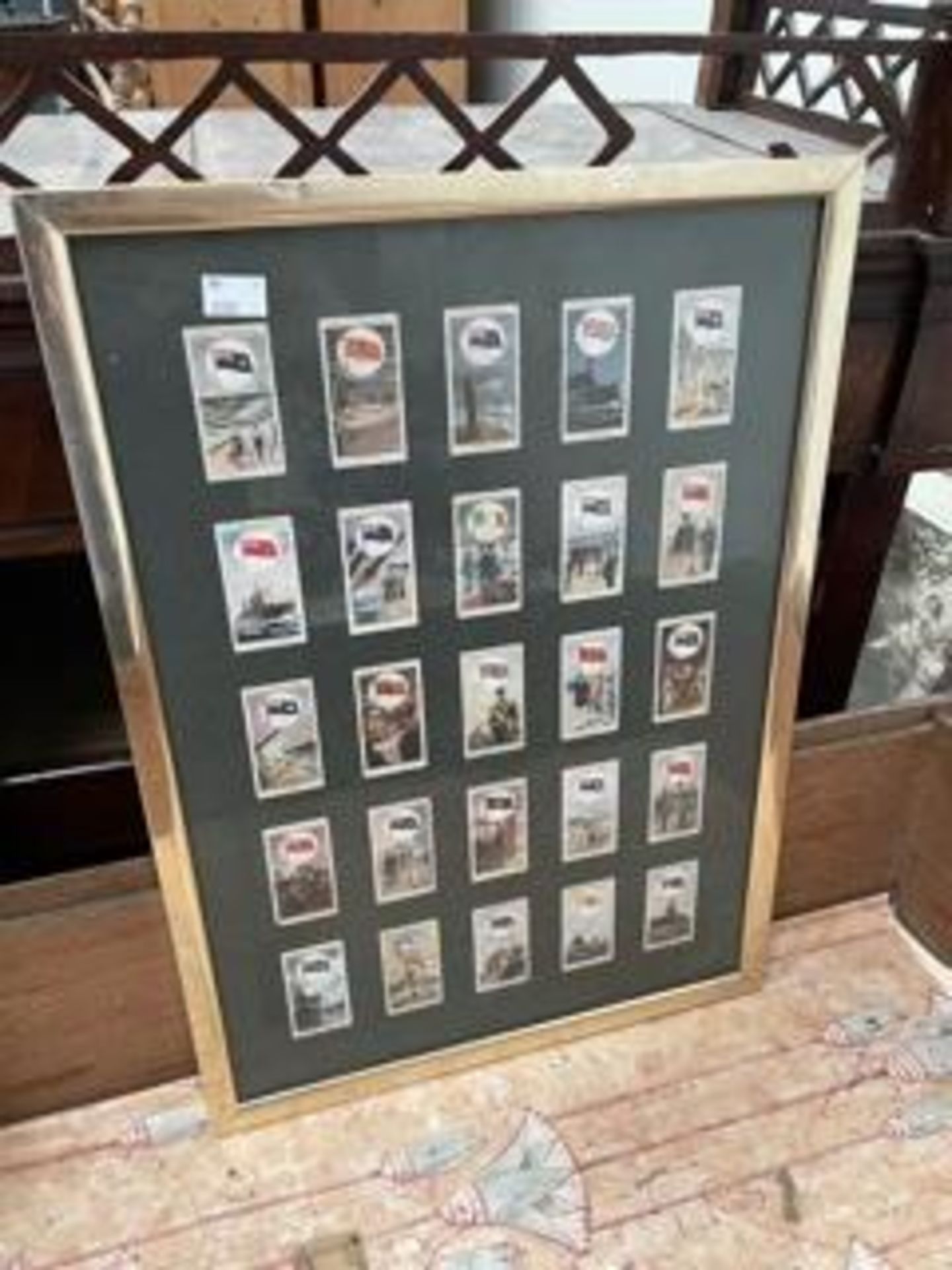 A framed collection of 25 Wills cigarette cards, together with an early photograph of Almondsbury