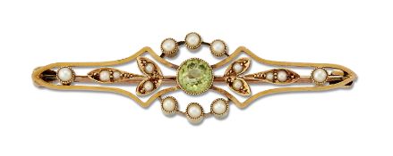 A LATE VICTORIAN PERIDOT AND SEED PEARL BROOCH