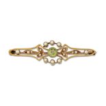 A LATE VICTORIAN PERIDOT AND SEED PEARL BROOCH