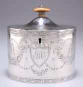 A GEORGE III SILVER TEA CADDY