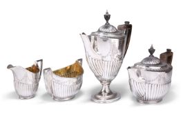 A VICTORIAN SILVER FOUR-PIECE TEA AND COFFEE SERVICE