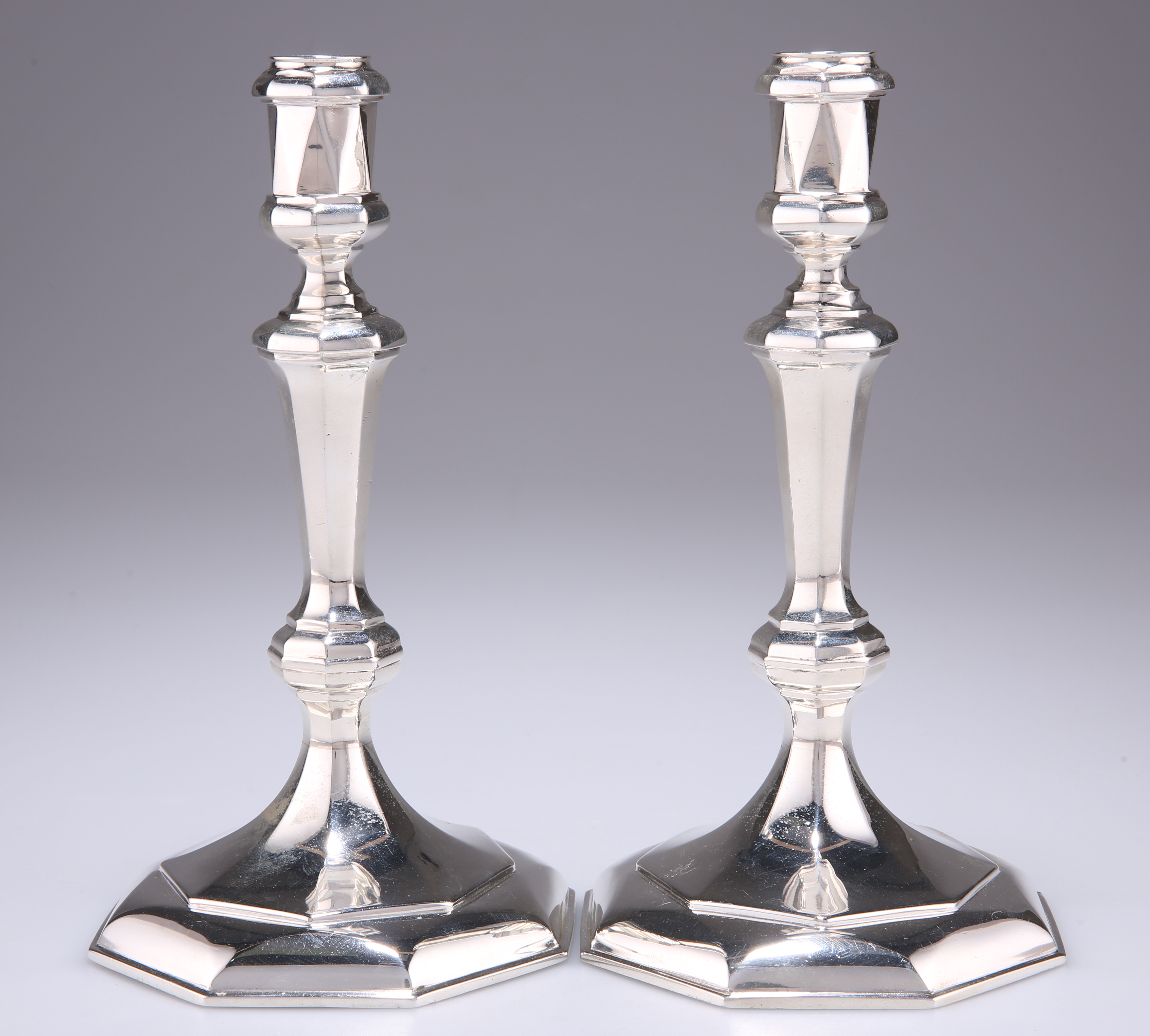 A PAIR OF ELIZABETH II SILVER CANDLESTICKS