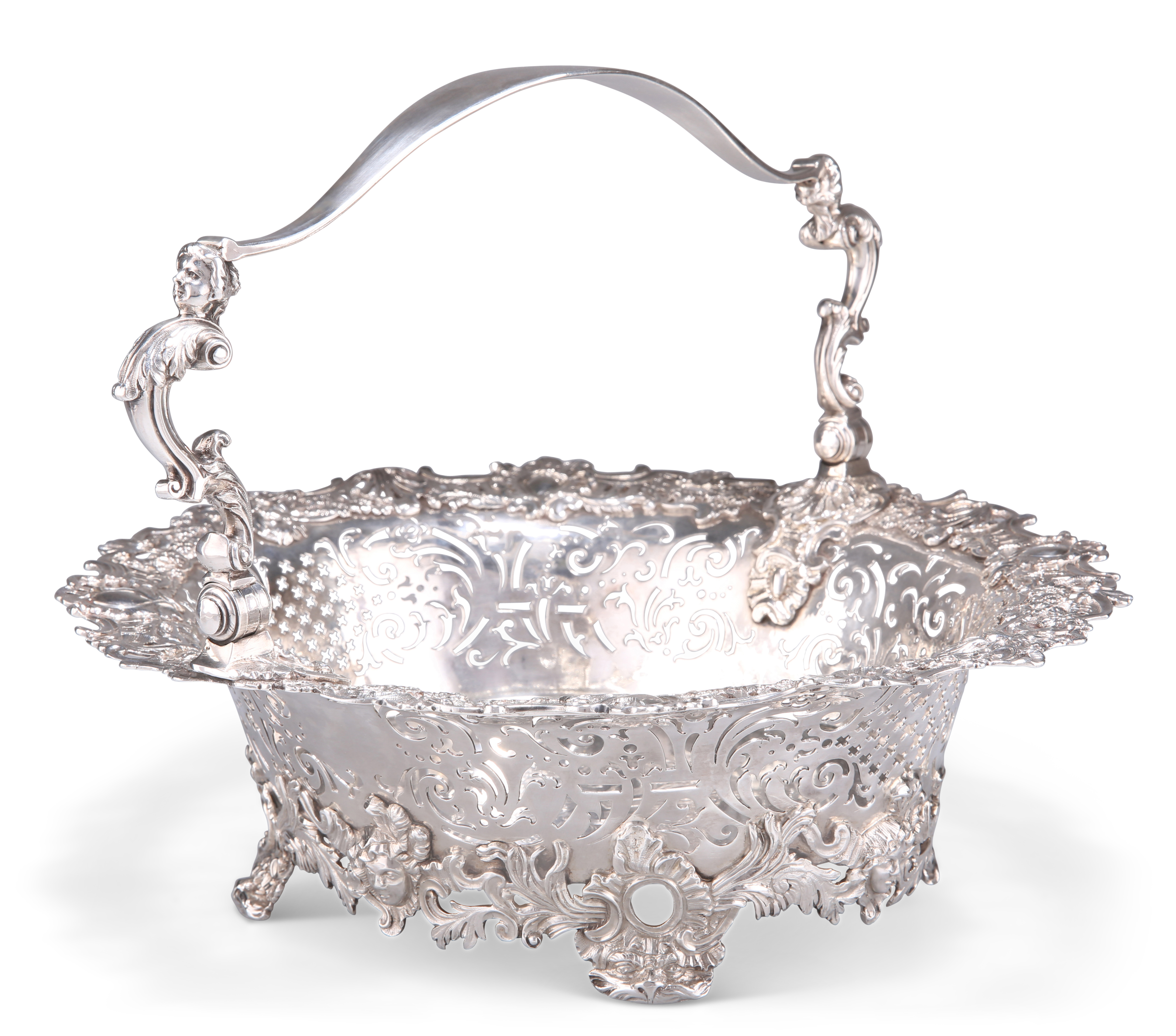 A GEORGE II ROCOCO SILVER CAKE BASKET