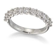 AN 18 CARAT WHITE GOLD DIAMOND HALF HOOP RING