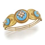 A 19TH CENTURY CORAL, DIAMOND AND BLUE ENAMEL BANGLE