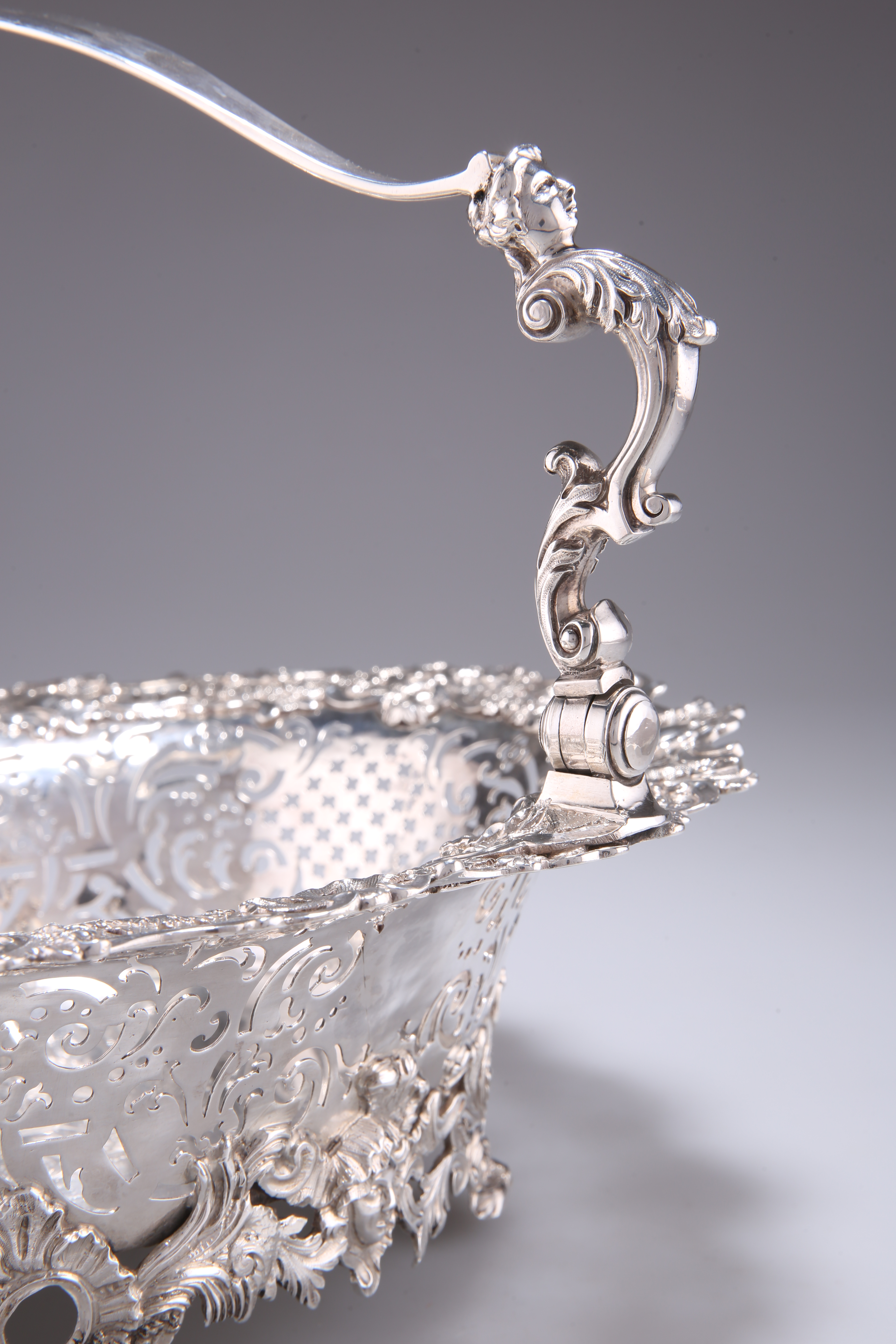 A GEORGE II ROCOCO SILVER CAKE BASKET - Image 4 of 6