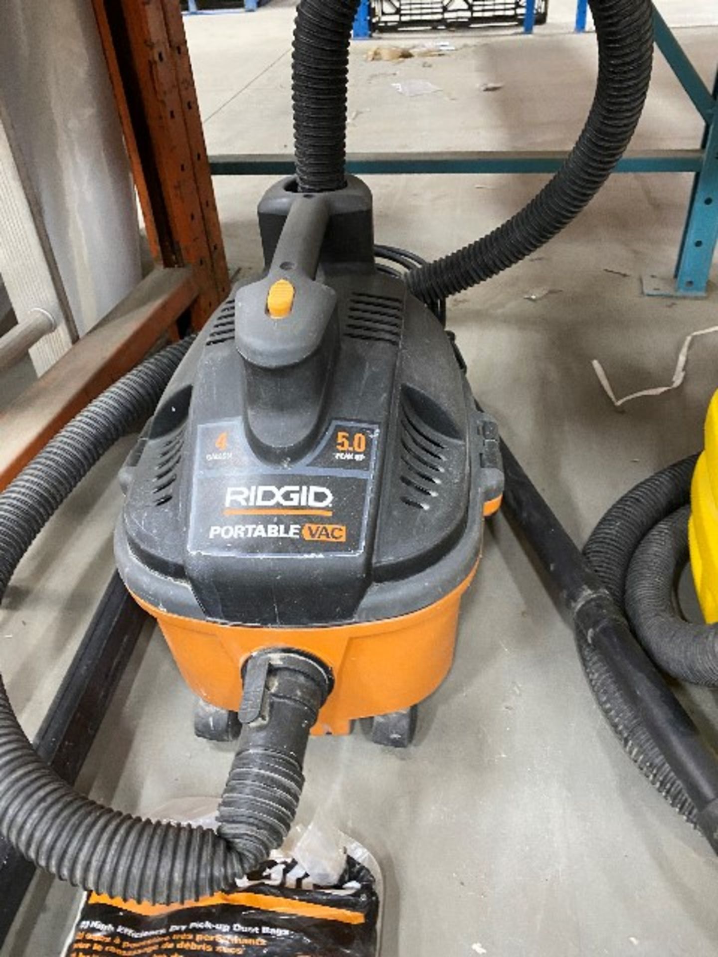 Rigid vacuum, 5 HP, 4 GAL