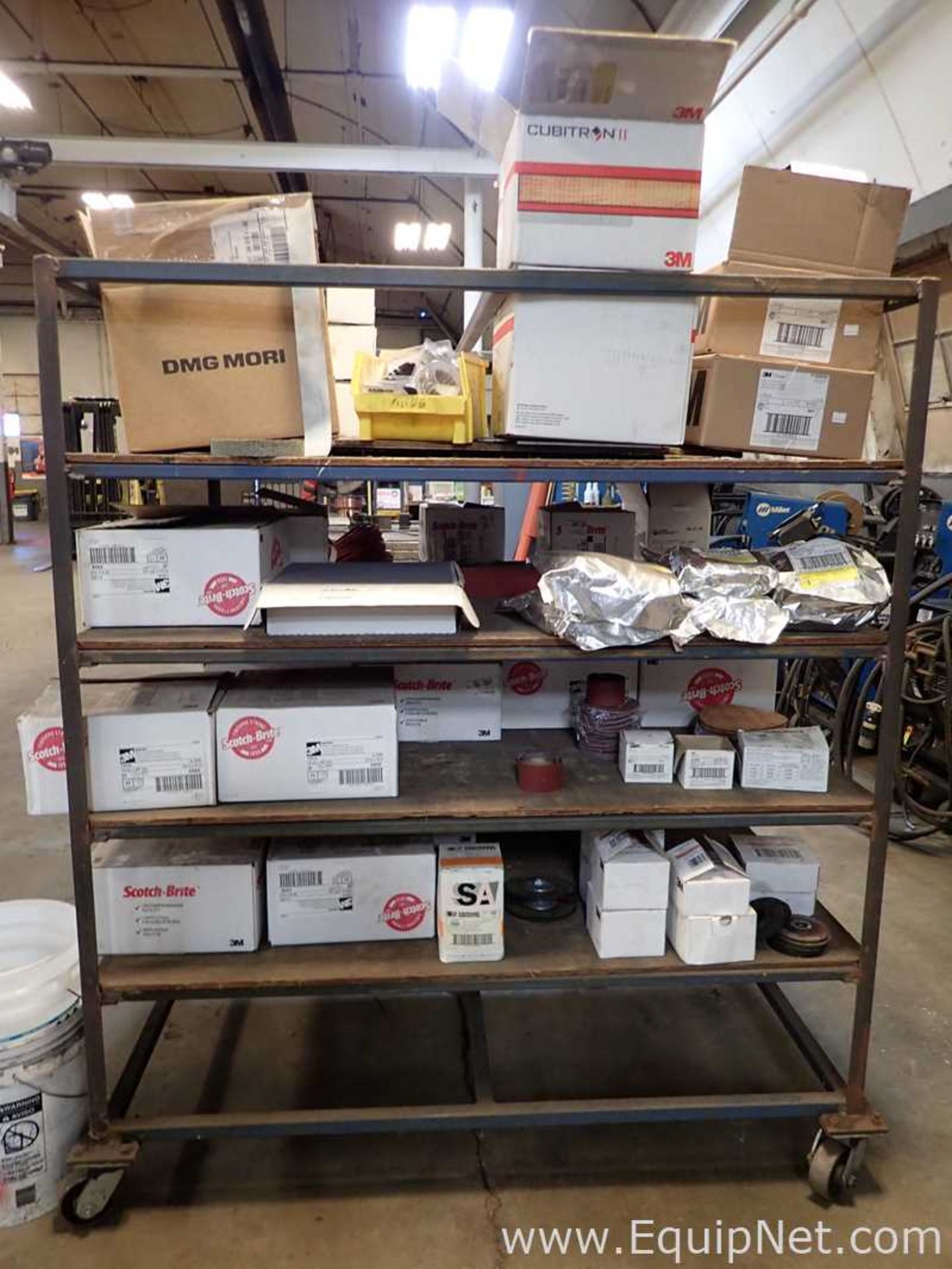 Storage Cart with Various Sanding Belts and Grinding Supplies