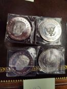 4 large silver coins