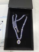 14KT white gold tanzanite and diamond necklace