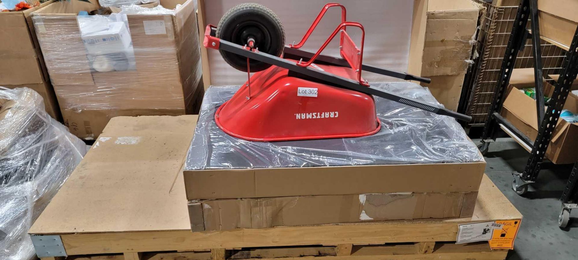 Wheel Barrow and Slab of Granite