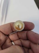 Gold custom made diamond and south sea pearl ring