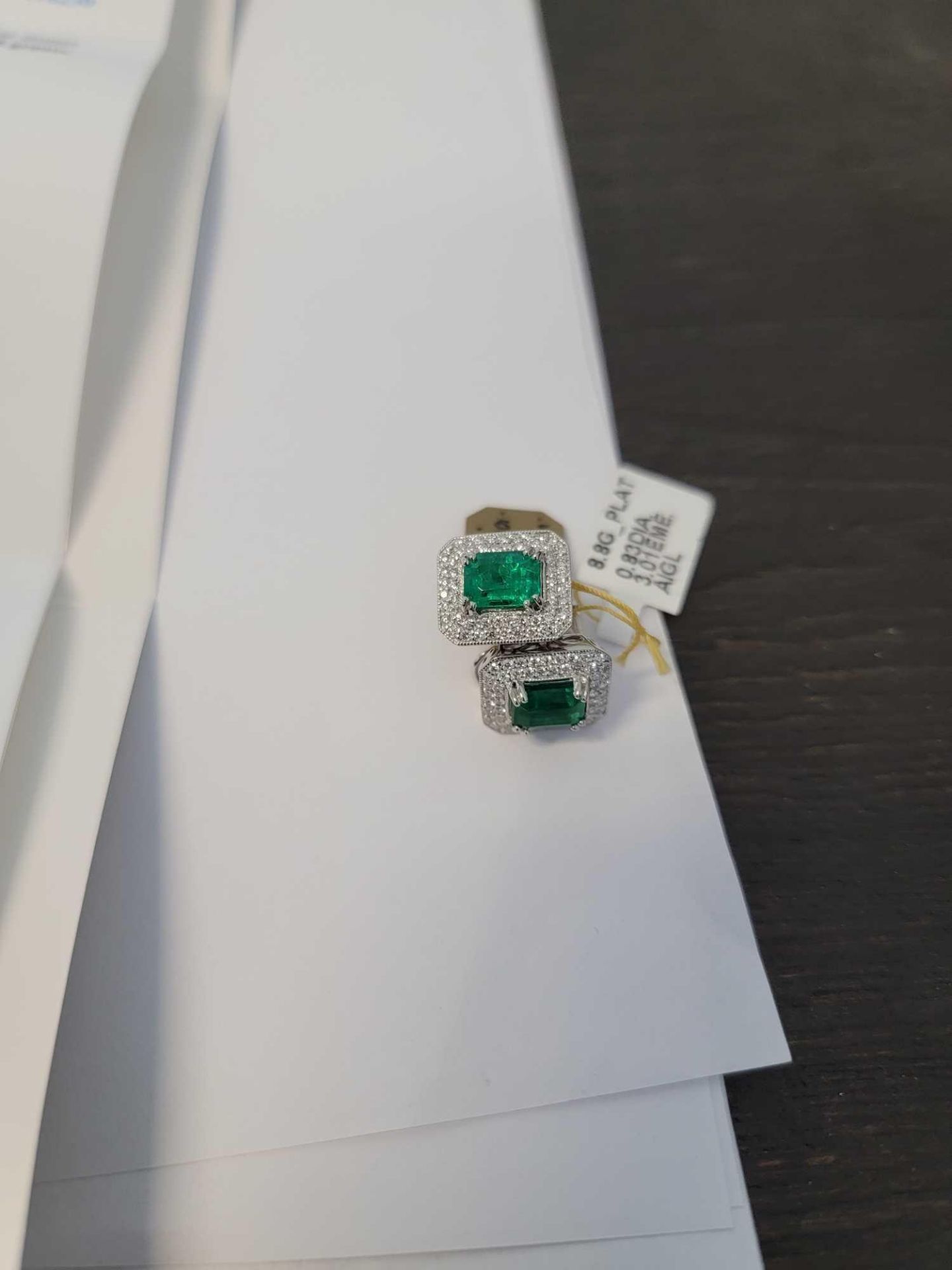 platinum emerald and diamond earrings