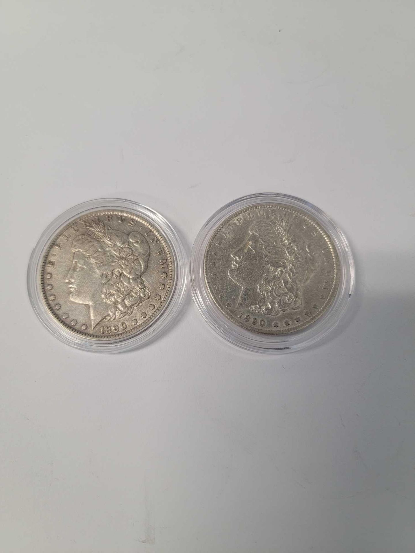 2 1890 Morgan Dollars