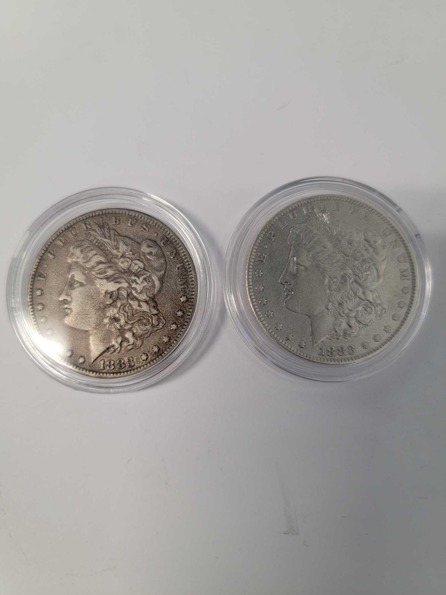 2 1883 Morgan Dollars